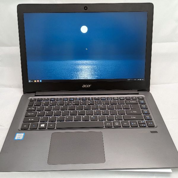 Refurbished Acer TravelMate laptop running Linux Mint